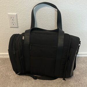 BEIS Black Travel Bag with Durable Fabric and Versatile Design